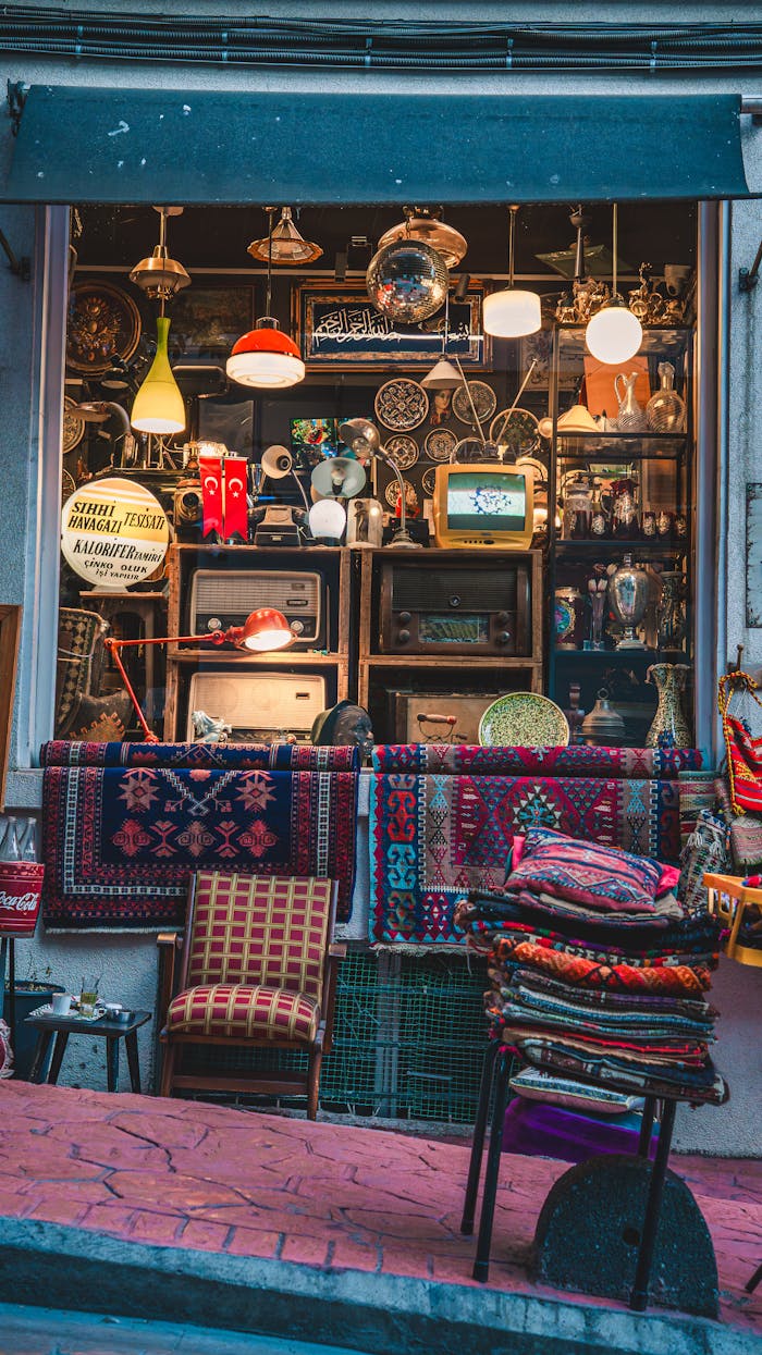 contact-img Discover a quaint antique shop displaying vibrant textiles and vintage items, evoking a sense of nostalgia.